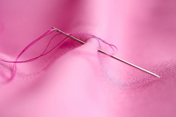 Origen de la aguja de coser